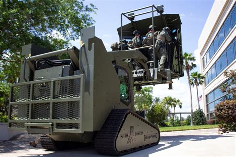 armored cat skid steer|police armored vehicle training.